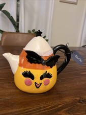 Teiera mais caramelle con viso