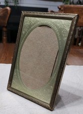 Cornice portafoto vintage Carr ottone tono oro ovale in rilievo cavalletto USA 5x7" 