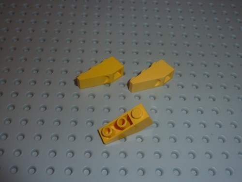 Lego yellow slope brick - yellow,