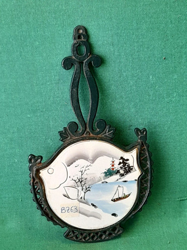 Vecchio sottopentola poggia - sottopentola,