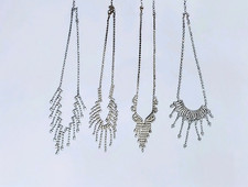 Set di quattro collane con