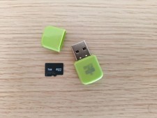 Micro SD  da 1 GB pari a nuova + adattatore USB