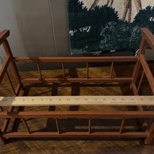 Antica culla bambola in legno