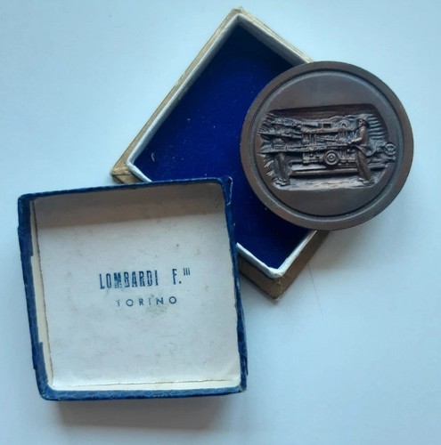 Medaglia centenario traforo