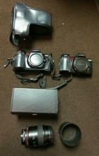 2 Minolta Cameras,1 Minolta