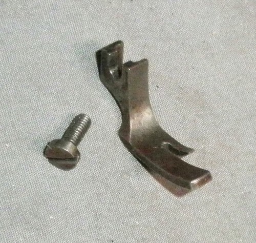 Antico piedino pressa macchina