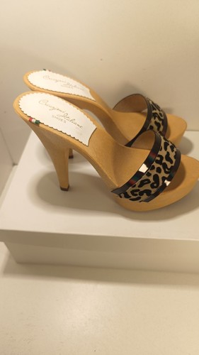 Zoccoli legno eseguiti - in,