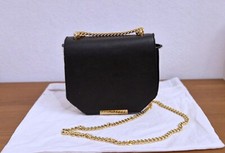 Borsetta con tracolla in oro, bianco e nero, by Pierre Darre'