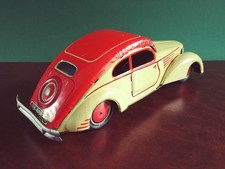 Raro giocattolo in latta auto