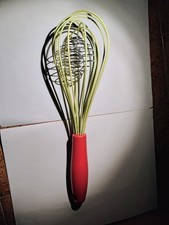 Frusta da cucina rossa e gialla 2 in 1 rompigrumi