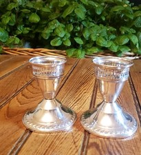 Coppia di portacandele pesati