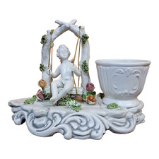 Putto su altalena - Statuina in ceramica bianca, Bassano del Grappa