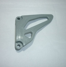 KAWASAKI KX 125 dal 1994 al 2002 PROTEZIONE COPRI PIGNONE PARAPIGNONE originale