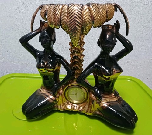 Orologio tavolo con statue - da,