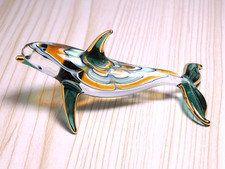 Statuina delfino verde ambra