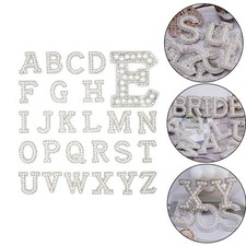 Toppe lettere perla bordo