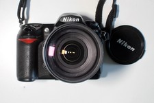 Nikon D200 con ob. 24-120mm f:3.5/5.6 D, caricabatteria, 2 batt, impugnatura