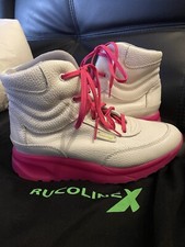 Sneakers/stivali alti in pelle