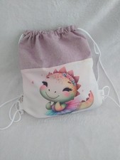 Sacca asilo bimba con dino