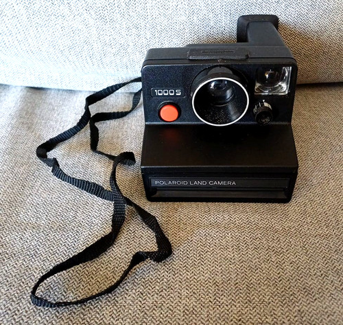 Polaroid 1000 land - s,