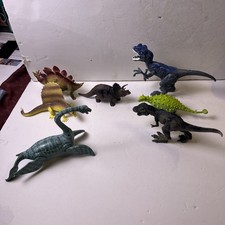 Lotto di 7 figurine dinosauri