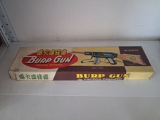 Giocattolo in latta mitra in