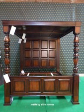 Letto a baldacchino in legno