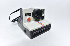 FOTOCAMERA VINTAGE POLAROID LAND 1000 SX70 FOTOCAMERA PELLICOLA ISTANTANEA TESTATA FUNZIONANTE