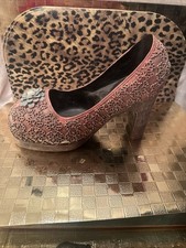 ��Scarpe porta vino tacco