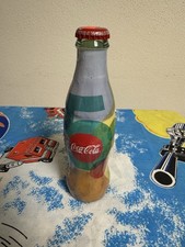 Bottiglia Coca Cola Avvolta