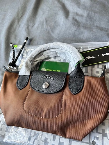Con etichette longchamp - con, le