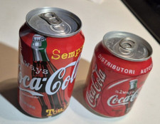 2 COCA COLA CANS 1 FULL