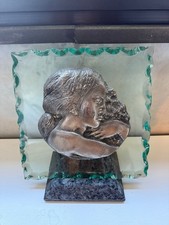 Bassorilievo in argento su cristallo di Emilio Greco