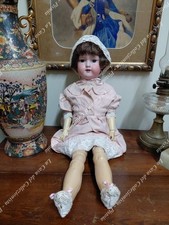 Antica bambola giocattolo