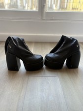 Stivali con plateau in pelle