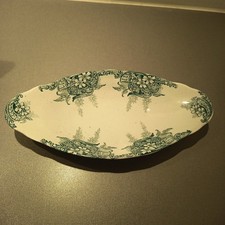 Ancien ravier en faience terre