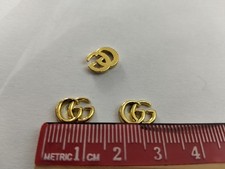 3 Targhette Gucci Colore Oro