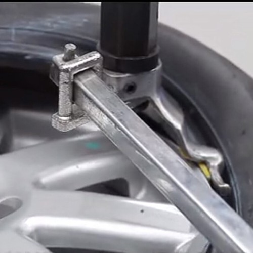 Portable manual tire changer - tire,