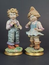 COPPIA SCULTURE IN PORCELLANA CAPODIMONTE VOLTA ANNI '80