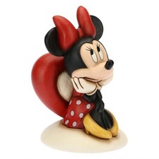 Minnie Disney Thun seduta con