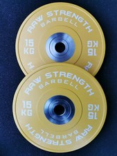PIASTRE PARAURTI GIALLE RAW STRONG BARBELL™ PREMIUM COMPETITION 15KG (COPPIA)