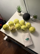Palline da tennis autografate