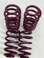 Ressort d'abaissement siège