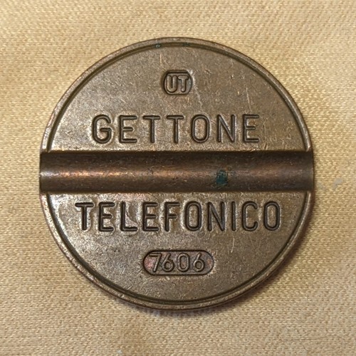 Gettone telefonico 7606 - telefonico,