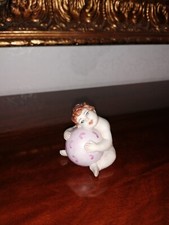 Bimba con palla rosa