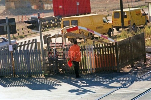 Photo damaged level crossing - damaged,