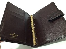 LOUIS VUITTON PARIS Marrone