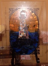 quadro faro del mare cornice