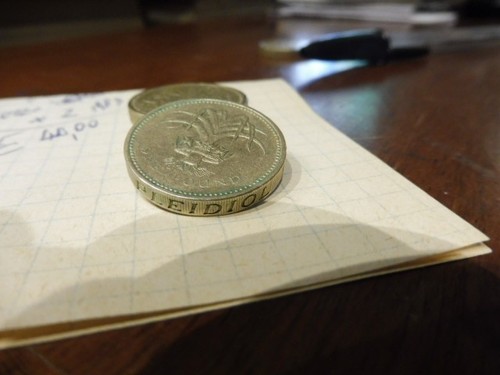 One pound 1985 - one,