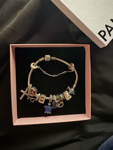 Pandora bracelet with 9 - bracelet,,